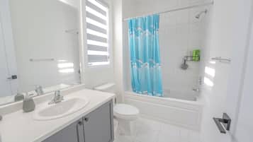 Hair dryer, bidet, towels, soap