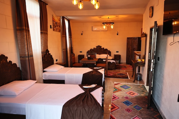 Family Quadruple Room, City View | In-room safe, desk, iron/ironing board, free WiFi