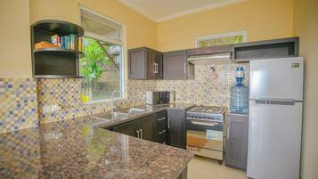 Family Suite, Balcony | Private kitchenette