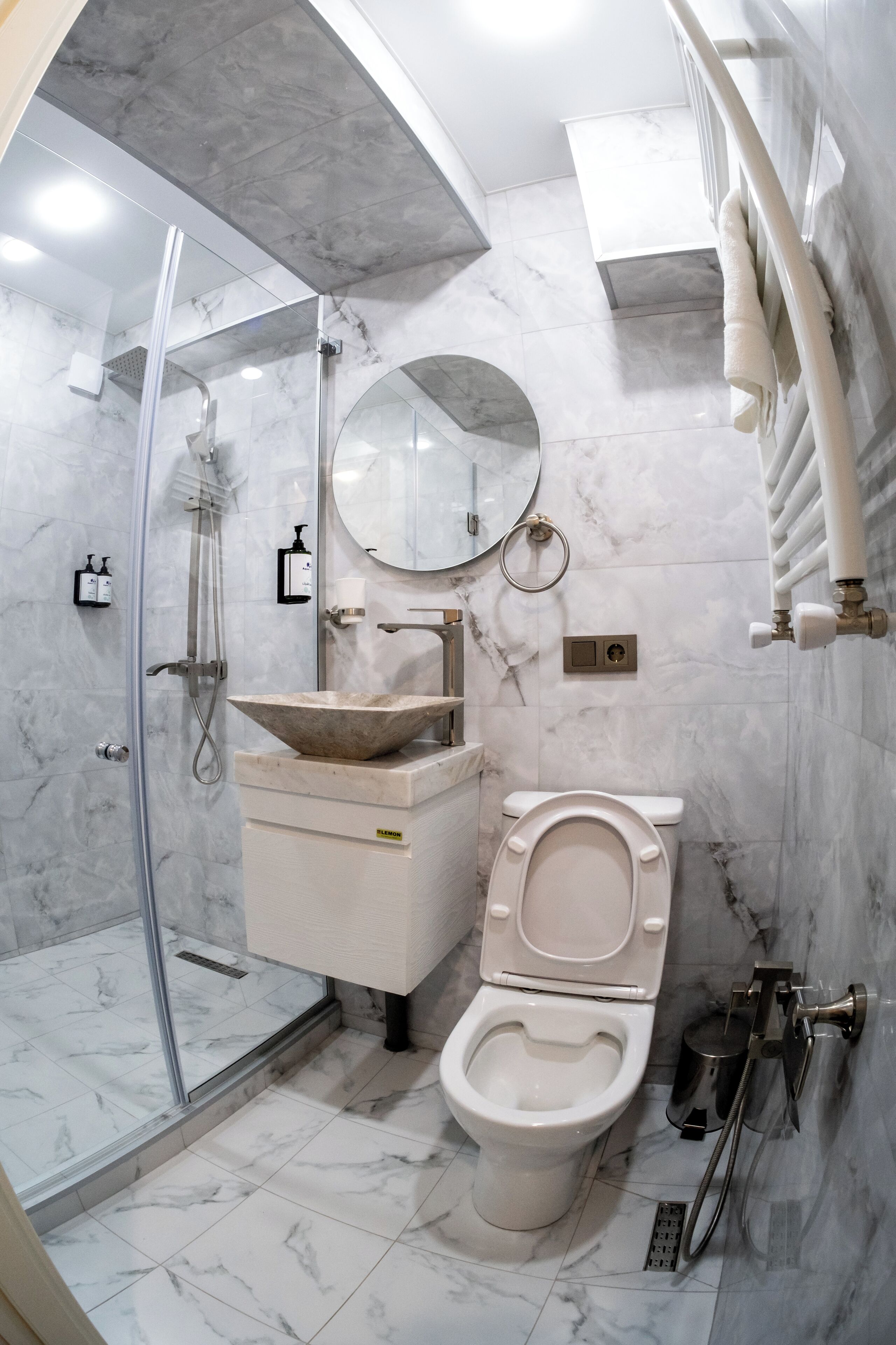 Shower, hair dryer, towels