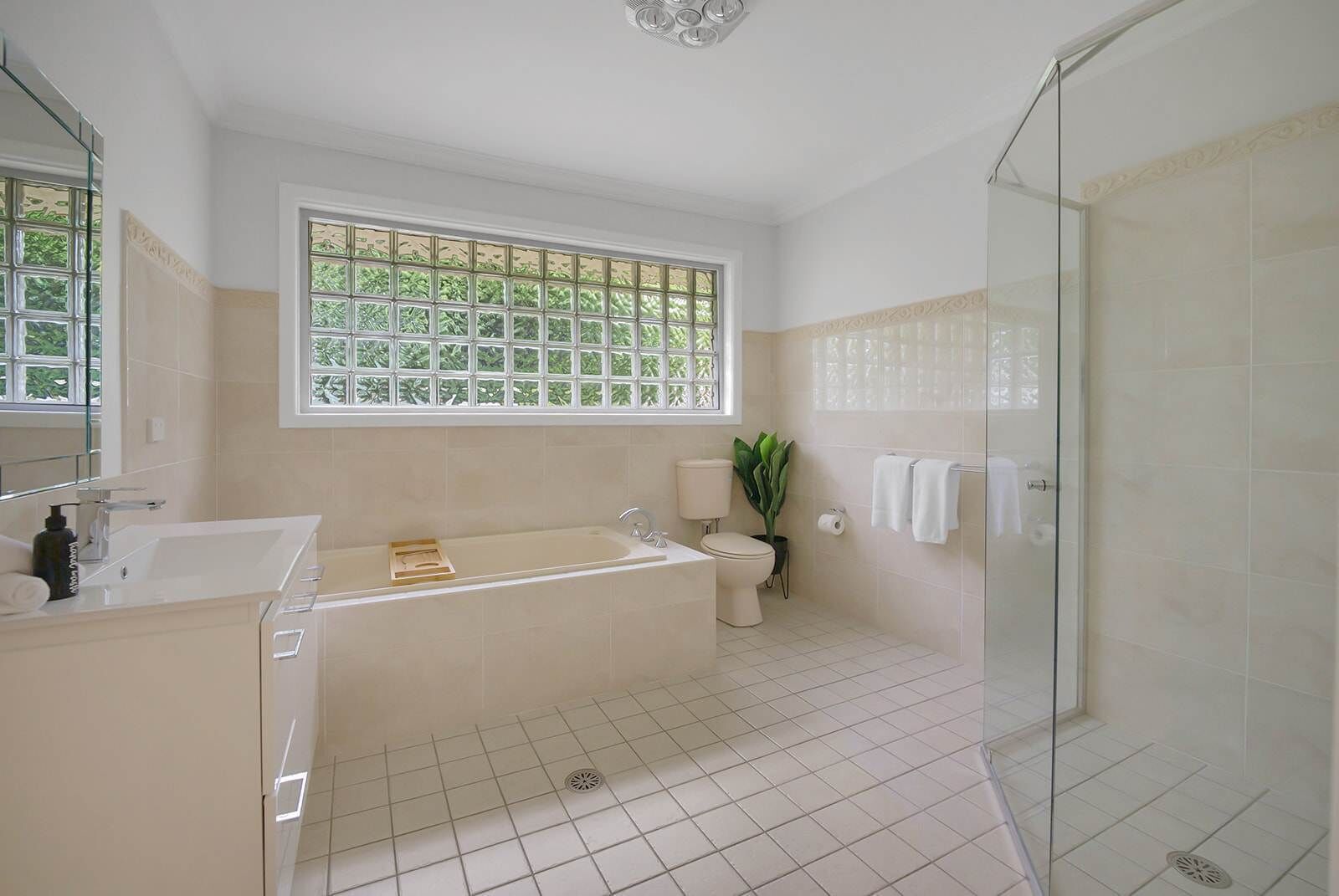 Shower, hair dryer, towels, shampoo