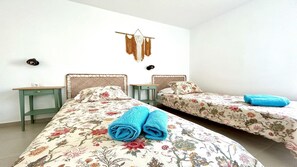 1 غرفة نوم ومكواة/لوح كي وخدمة الإنترنت وملاءات أسرّة