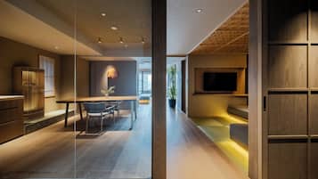 Deluxe Suite, 1 Bedroom, City View | In-room safe, blackout curtains, iron/ironing board, free WiFi