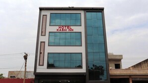A modern hotel building with a sign reading "HOTEL KASHI INN". - Hotel Kashi Inn (Jodhpur)