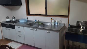 Fridge, microwave, cookware/dishes/utensils