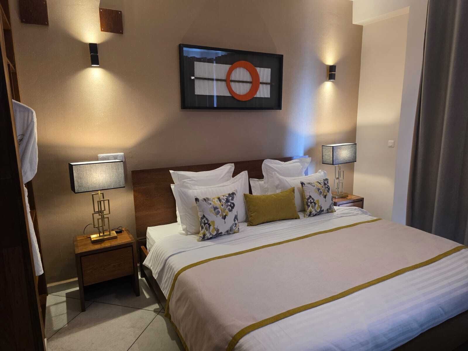 Deluxe Apartment, Balcony, City View | Egyptian cotton sheets, premium bedding, pillowtop beds, minibar