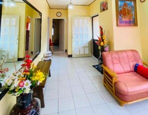 Family House, Courtyard View | Living area | 32-inch LED TV with satellite channels, Netflix, streaming services