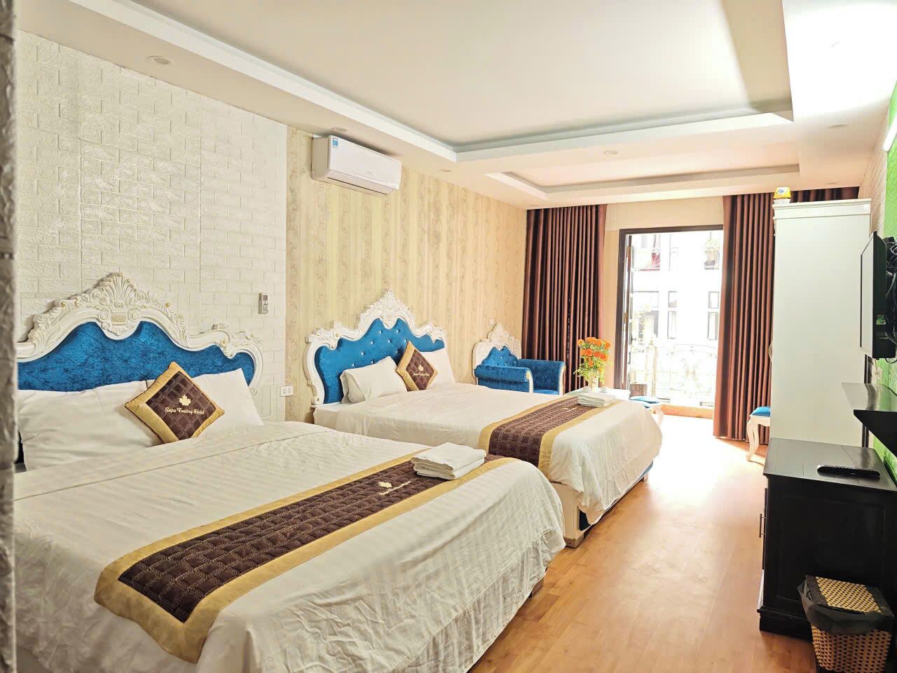 Deluxe Quadruple Room, Balcony, City View | Soundproofing, free WiFi