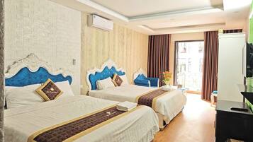 Deluxe Quadruple Room, Balcony, City View | Soundproofing, free WiFi