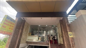 The entrance of Ruby Star Hotel with a clear sign above the entrance and a staircase leading inside. - The Sóng - Ruby Star Hotel Apartment (Ho Chi Minh City)