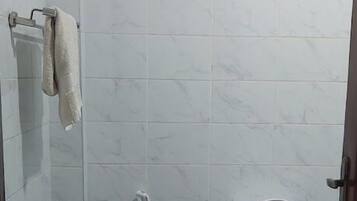 Deluxe Single Room, City View | Bathroom | Shower, slippers, towels, soap