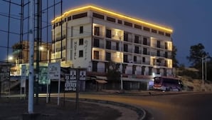 A multi-story hotel with a flat roof and a sign indicating it is a hotel. - Hoyjiifka Hotel Azora (Moyale)