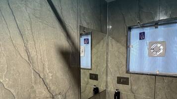 Shower, towels, soap, shampoo