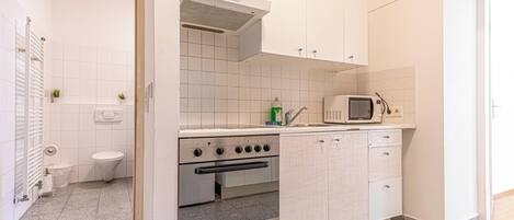 Apartment | Private kitchen | Fridge, microwave, oven, stovetop