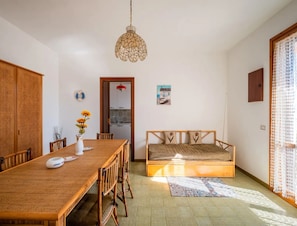 Apartment, Balcony, City View | Living area | 32-inch flat-screen TV with cable channels - Villetta Marinaci Porto Cesareo (Porto Cesareo)