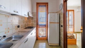 Apartemen, balkon, pemandangan kota | Dapur pribadi | Mesin espresso, lemari es, oven, dan kompor