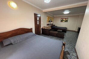 ห้องดีลักซ์ | โต๊ะทำงาน, Wi-Fi ฟรี, ผ้าปูที่นอน