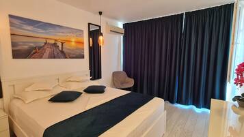 Kahden hengen standard-huone, näköala puutarhaan | Tallelokero huoneessa, ilmainen Wi-Fi