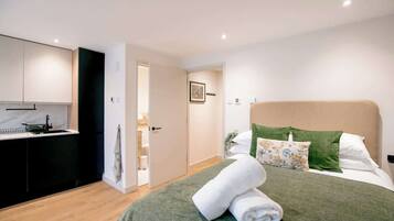 1 slaapkamer, een strijkplank/strijkijzer, wifi, beddengoed