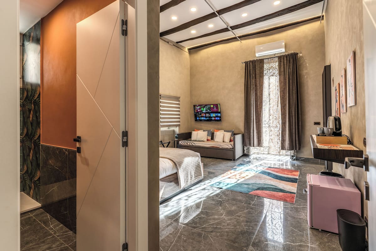 Classic Quadruple Room, Balcony, City View | Free WiFi