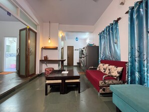 Royal Suite | Living area | 42-inch flat-screen TV with satellite channels - Gaur Opulent Goa (Candolim)