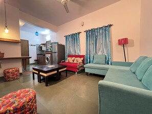 Royal Suite | Living area | 42-inch flat-screen TV with satellite channels - Gaur Opulent Goa (Candolim)