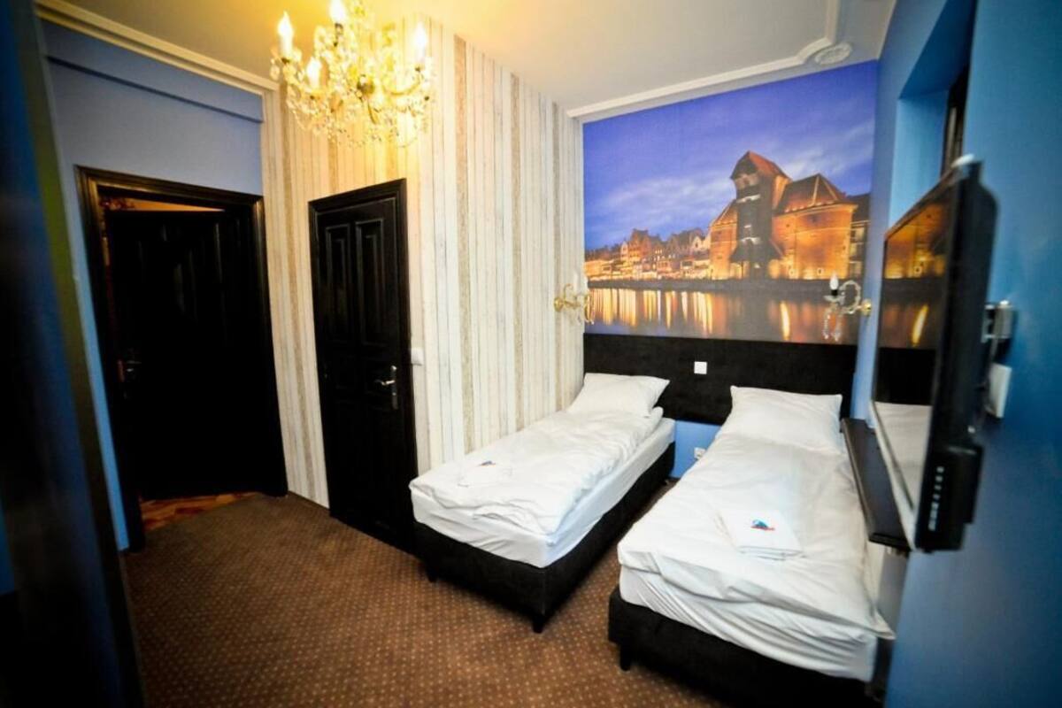 Quadruple Room, Private Bathroom | Iron/ironing board (on request), WiFi (free)