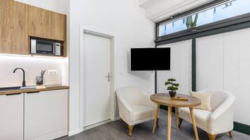 Fridge, microwave, stovetop, coffee/tea maker