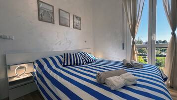 1 chambre, fer et planche Ă repasser, Wi-Fi, draps fournis