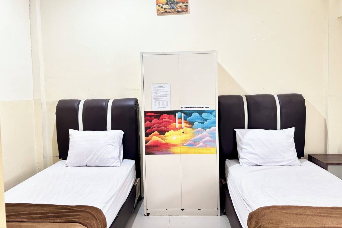 Habitación Deluxe con 2 camas individuales | Wifi gratis y ropa de cama