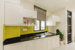 Standard Apartment, 1 Bedroom, Balcony, City View | Desk, free WiFi - Nguyen Homestay Phan Ton - District 1 (Da Kao)