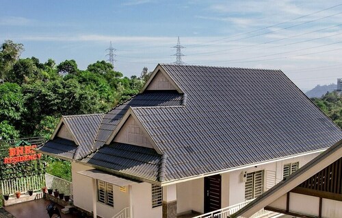 Affordable garden view stay in misty Munnar
Free Wi‑Fi, breakfast, parking