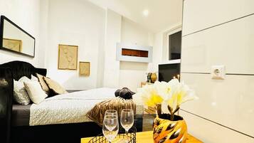 1 bedroom, desk, iron/ironing board, bed sheets