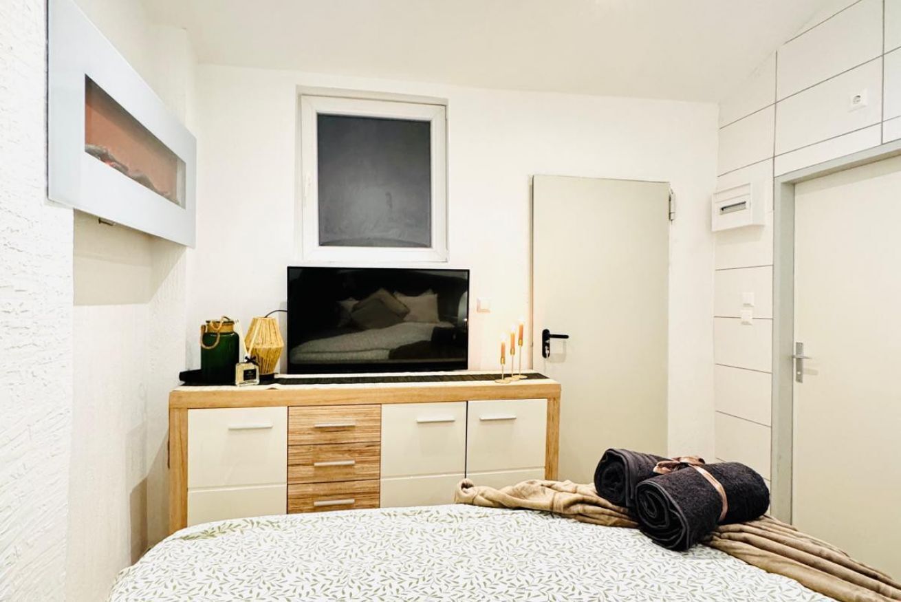 1 bedroom, desk, iron/ironing board, bed sheets