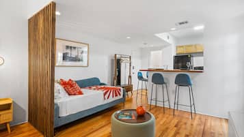 Exclusive Studio, Patio | Living area | 50-inch Smart TV with digital channels