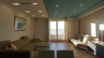 Diamond Penthouse Apartment | Living area | 82-cm LED TV with cable channels