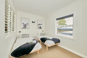 2 bedrooms, iron/ironing board, travel cot, bed sheets