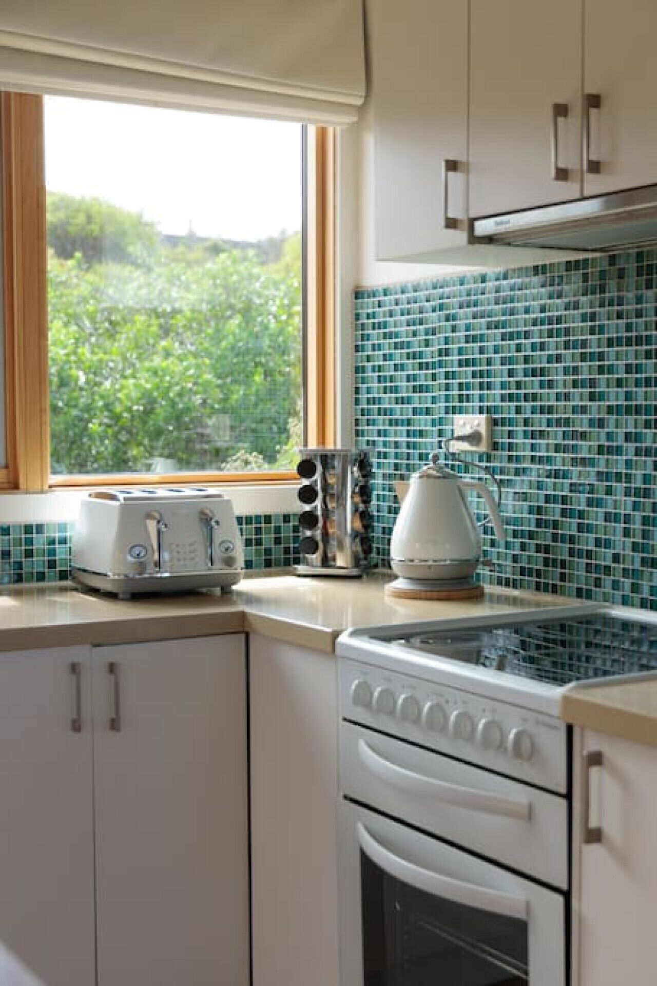 Fridge, coffee/tea maker, cookware/dishes/utensils