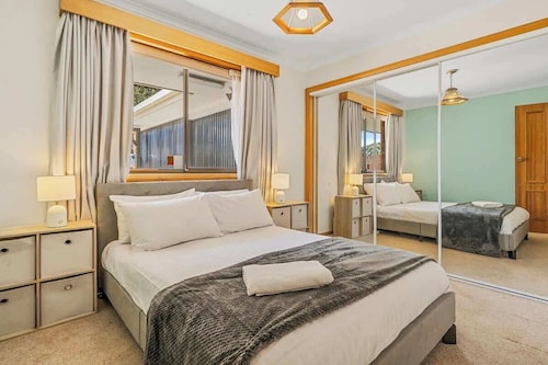 "The Lookout" with City, Water and Mountain Views.