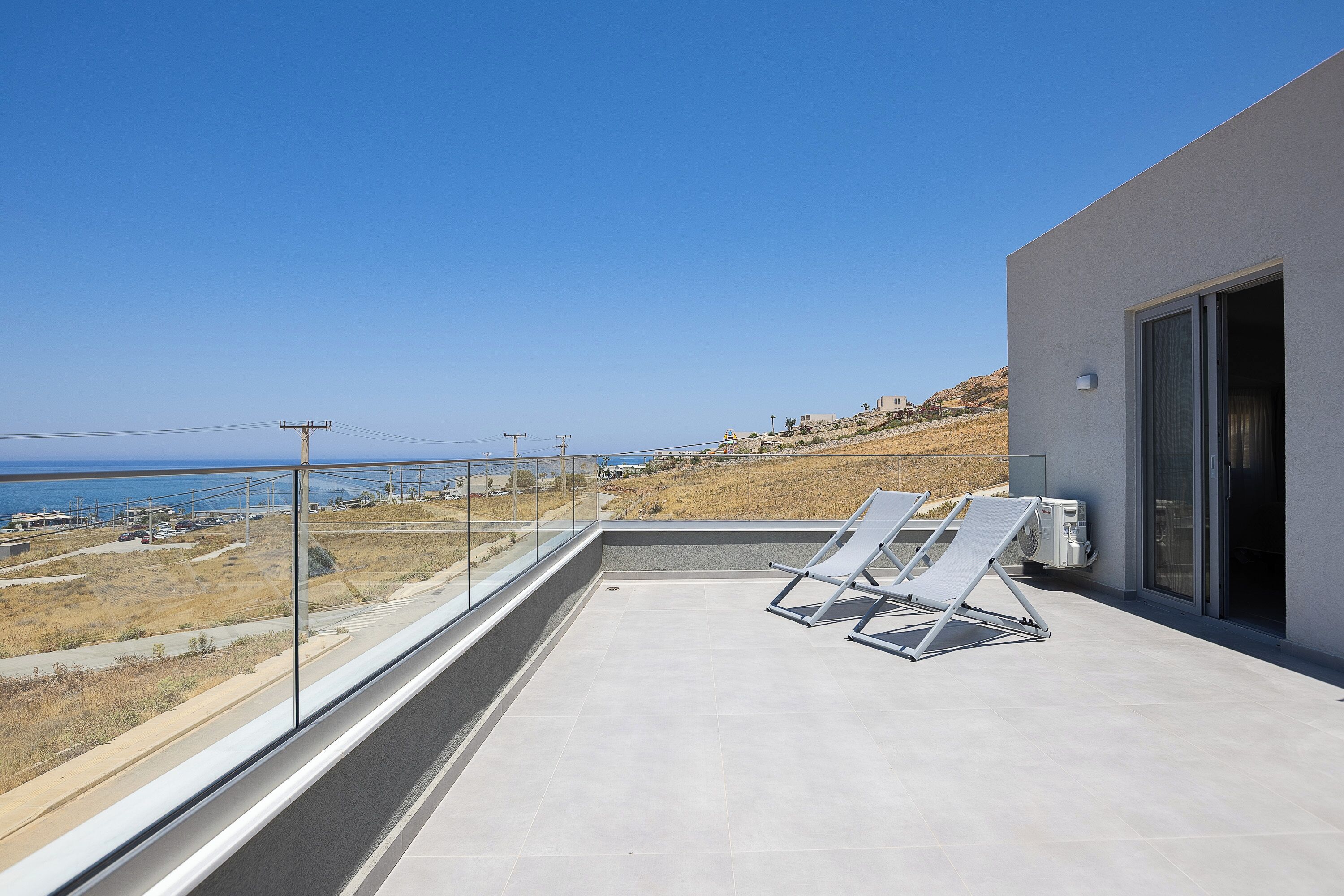 Villa superior, vista al mar | Terraza o patio