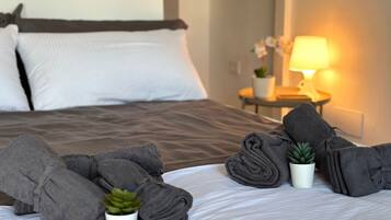 2 dormitorios, tabla de planchar con plancha, wifi y ropa de cama