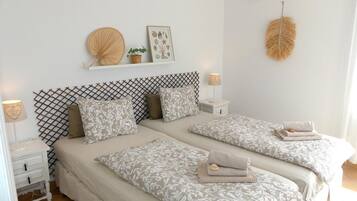 2 habitaciones, tabla de planchar con plancha, wifi y ropa de cama