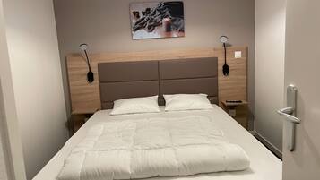 Wi-Fi de cortesia, roupa de cama