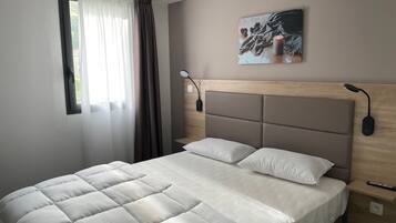 2 quartos, Wi-Fi de cortesia, roupa de cama