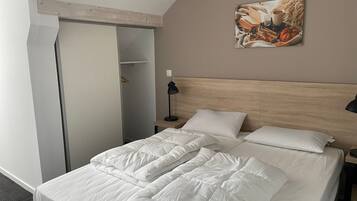 2 habitaciones, wifi gratis y ropa de cama