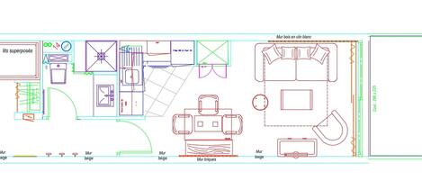 A floor plan with a kitchen, living area, and bedroom, including labeled furniture and room dimensions.