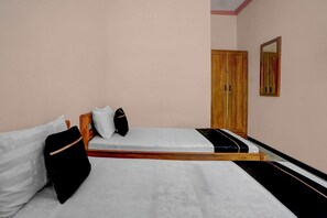 Habitación Deluxe con 2 camas individuales | Wifi gratis y ropa de cama 