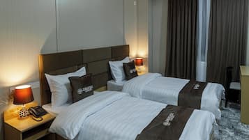 Kamer, 1 twee- of 2 eenpersoonsbedden | Een laptopwerkplek, gratis wifi