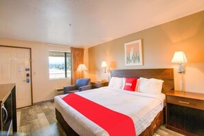 Tabla de planchar con plancha, wifi gratis y ropa de cama 