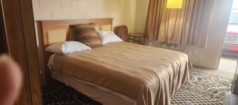 Simple Yet Functional Room w/ Comfy Bed Near Shiloh Vineyard for Wine Enthusiast